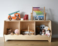 A Toy Cubby Shelf With Wavy Decor By Miza
